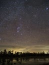 Orion constellation stars pleiades and Moon observing night sky nightscape Royalty Free Stock Photo
