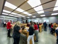 An Apple store with people waiting to purchase Apple Macbooks, iPads and iPhones Royalty Free Stock Photo