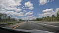 Cars and trucks driving on Florida Interstate Highway 528 in Orlando, Florida
