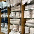 A display of bed linens for sale at a Pottery Barn Retail Store in Orlando, Florida Royalty Free Stock Photo