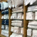 A display of bed linens for sale at a Pottery Barn Retail Store in Orlando, Florida Royalty Free Stock Photo