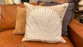 A group of pillows on a couch for sale at a Pottery Barn Retail Store in Orlando, Florida Royalty Free Stock Photo