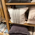 A group of pillows  for sale at a Pottery Barn Retail Store in Orlando, Florida Royalty Free Stock Photo