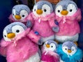 A bin of plush stuffed animal Penguins at SeaWorld Orlando ready for a park guest to purchase