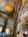 A decorative post of a woman underwater at the Mythos Restaurant at Universal Studios in Orlando, Florida