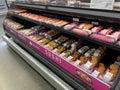 Fresh and handmade Sushi in the refridgerated aisle of a Sams Club grocery store ready to be purchased by consumers