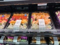 Fresh and handmade Sushi in the refridgerated aisle of a Sams Club grocery store ready to be purchased by consumers