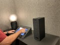 Orlando, FL/USA - 10/18/19 - A man pressing the Sonos speaker display tablet at an IKEA store Royalty Free Stock Photo
