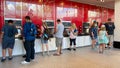 People pouring soda from a sample soda fountain Royalty Free Stock Photo