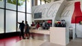 People purchasing soda from an international  Coca Cola soda fountain Royalty Free Stock Photo