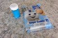 Prepackaged Pillsbury sugar cookies and blue sprinkles ready to be baked Royalty Free Stock Photo