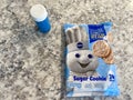 Prepackaged Pillsbury sugar cookies and blue sprinkles ready to be baked Royalty Free Stock Photo