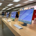 A row of iMac Computers at an Apple store Royalty Free Stock Photo