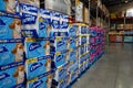 Stacks of Charmin, Scott, Quilted Northern brands toilet paper at a store