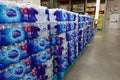 Stacks of Nestle bottled water at a retail store