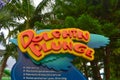 Colorful Dolphing Plunge sign at Aquatica water park .