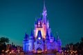 Panoramic view of illuminated Cinderella`s Castle on blue night background in Magic Kingdom at Walt Disney World 2 Royalty Free Stock Photo