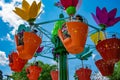 Parents and kids enjoying colorful flower pots aboard AbbyÃ¢â¬â¢s Flower Tower at Seaworld in International Drive area 1