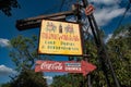 Vintage Coca Cola sign in Asia area at  Animal Kingdom. Royalty Free Stock Photo