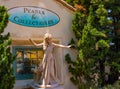 Woman living statue throws small jets of water from her hands at Seaworld in International Drive area 2