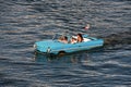 Water Taxi , Blue Vintage Car, Funny People.