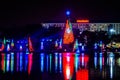 Illuminated and colorful Sea of Christmas Trees and partial view of Reinassance Hotel at Seaworld 5