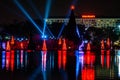 Illuminated and colorful Sea of Christmas Trees and partial view of Reinassance Hotel at Seaworld 2.