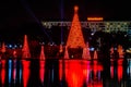 Illuminated and colorful Sea of Christmas Trees and partial view of Reinassance Hotel at Seaworld 8