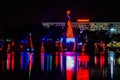 Illuminated and colorful Sea of Christmas Trees and partial view of Reinassance Hotel at Seaworld 16