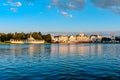 Panoramic view of lovely Victorian ride on dockside and restaurants on lightblue cloudy background at Lake Buena Vist