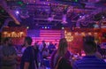 People enjoying midnight in colorful american bar in International Drive area 1