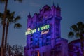 The Twilight zone Tower of Terror and palm trees on blue sky background in Hollywood Studios at Walt Disney World  7 Royalty Free Stock Photo