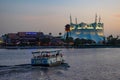 Cirque du Soleil , House of Blues and taxi boat sailing in Disney Springs at Lake Buena Vista . Royalty Free Stock Photo