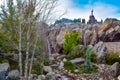 Beautiful view of waterfall and The Beast Castle Be Our Guest restaurant in Magic Kingdom at Walt Disney World.