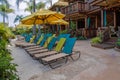 Colorful beach chairs and cabanas at Volcano Bay in Universal Studios area