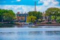 France Pavilion and blue lake on lightblue cloudy sky background at Epcot in Walt Disney World 1