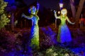 Frozen Elsa and Ana illuminated topiaries on beautiful scenery at Epcot in Walt Disney World Royalty Free Stock Photo