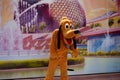 Funny Pluto posing for photo at Epcot in Walt Disney World .