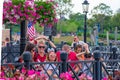 Funny vacations family posing and greeting for photo at Epcot in Walt Disney World 3