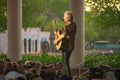 Graham Rusell by Air Supply playing guitar is Special Show at Epcot in Walt Disney World .