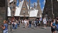 People walking in The Wizarding World of Harry Potter Hogsmeade at Island of Adventure