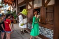 People watch as Fiona, Shrek and donkey talk. at Universal Studios