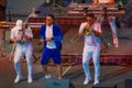 Randy Malcom by Gente de Zona dancing with two trumpeters from the band at Seaworld in International Drive Area 1