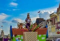 Top view of Goofy in Mickey and Minnie`s Surprise Celebration on lightblue sky background parade at Walt Disney World. Royalty Free Stock Photo