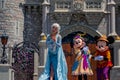 Elsa, Mickey and Minnie on Mickey`s Royal Friendship Faire on Cinderella Castle in Magic Kingdom . Royalty Free Stock Photo