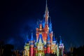 Illuminated and colorful Cinderellas Castle in Magic Kingdom at Walt Disney World .