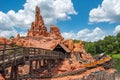 People enjoying amazing Big Thunder Mountain Railroad on cloudy sky background in Magic Kingdom at Walt Disney World 17