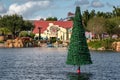 Christmas trees on lake and colorful buidlings and at Seaworld 2