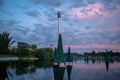 Christmas Trees on lake and Sky Tower on beautiful sunset background at Seaworld 3 Royalty Free Stock Photo