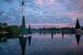 Christmas Trees on lake and Sky Tower on beautiful sunset background at Seaworld 2 Royalty Free Stock Photo